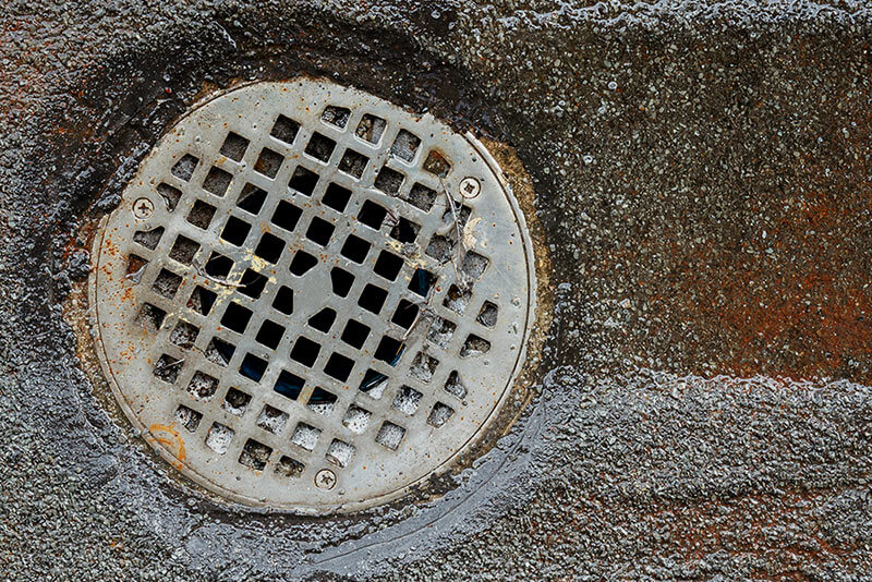 basement shower drain above floor