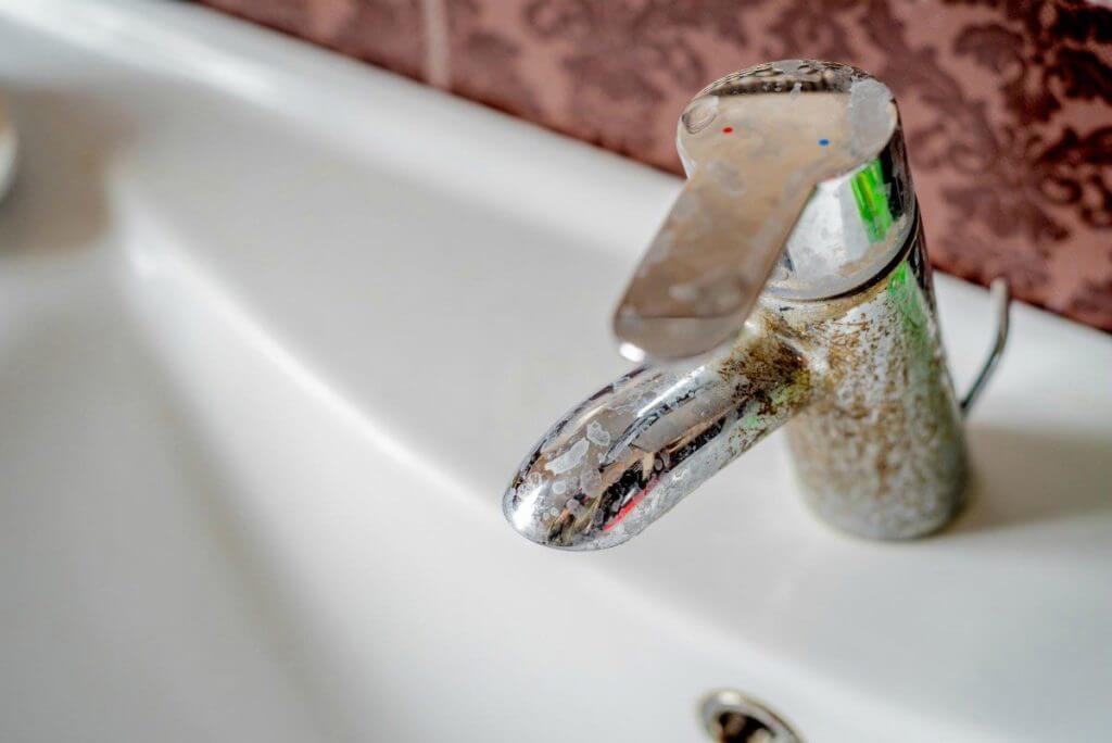 mineral deposits on bathroom sink